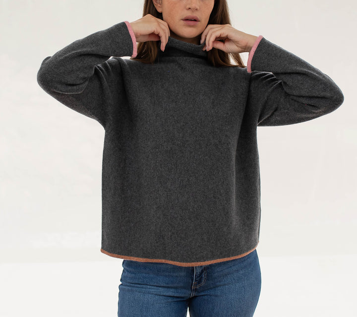 ash grey pure cashmere jumper with pink cuff trim and brown waist trim, made by Cocoa Cashmere