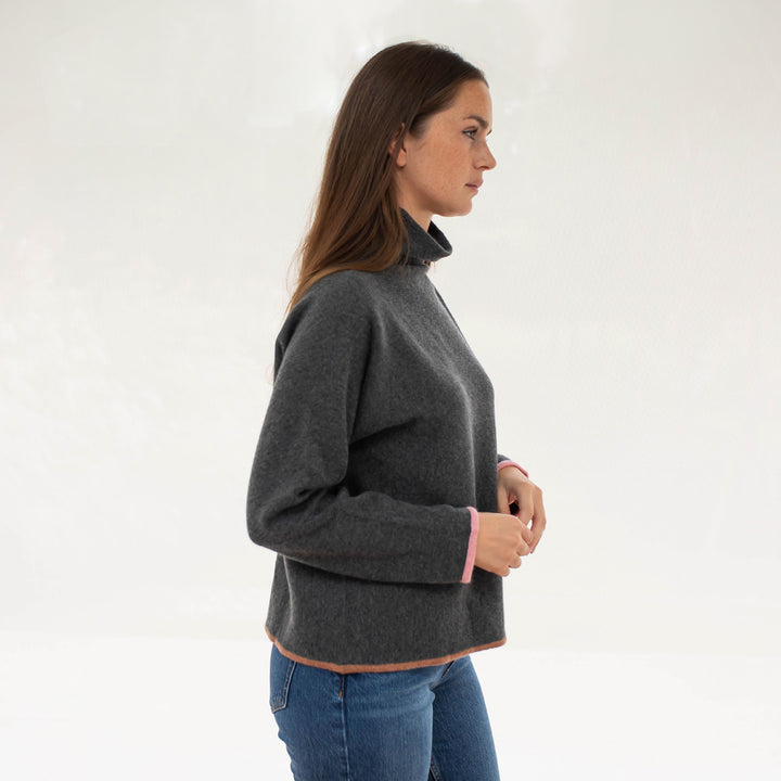 ash grey pure cashmere jumper with pink cuff trim and brown waist trim, made by Cocoa Cashmere