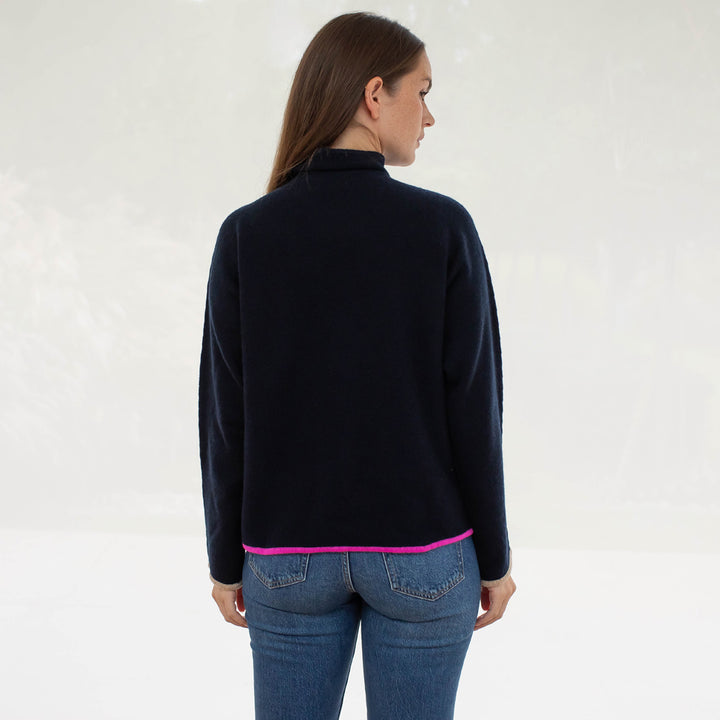 Navy Blue Pure Cashmere funnel neck Jumper with bright pink trim at the waist and camel trim at the wrist, made by Cocoa Cashmere