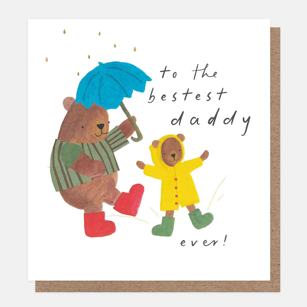 Card with illustration of two bears, one holding an umbrella and the other in a raincoat, with text 'to the bestest daddy ever!' on a white background.