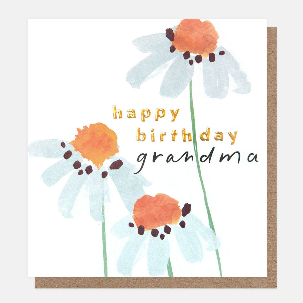 greetings card featuring blue watercolour daisies and the text 'happy birthday grandma' in gold