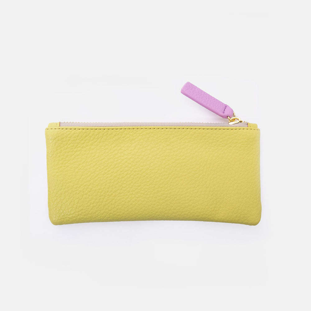 light green pencil case with a pink zipper on a white background