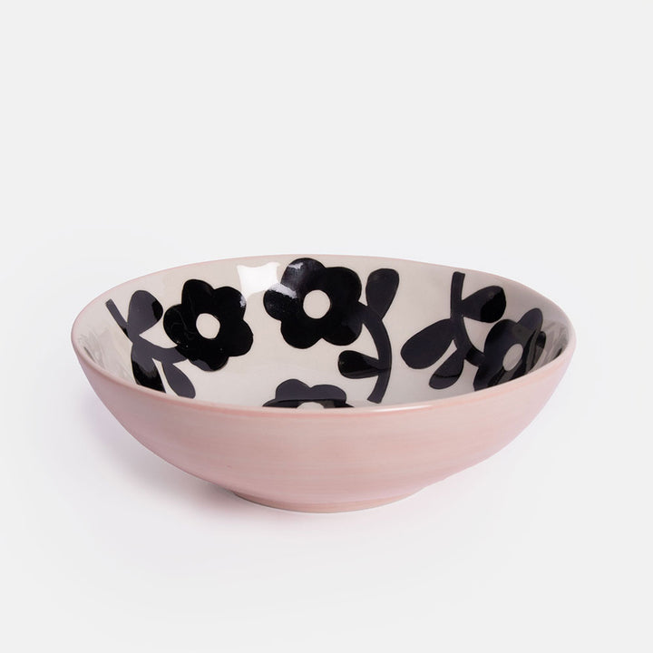 ceramic stoneware cereal bowl with pink outer and monochrome flower design inside