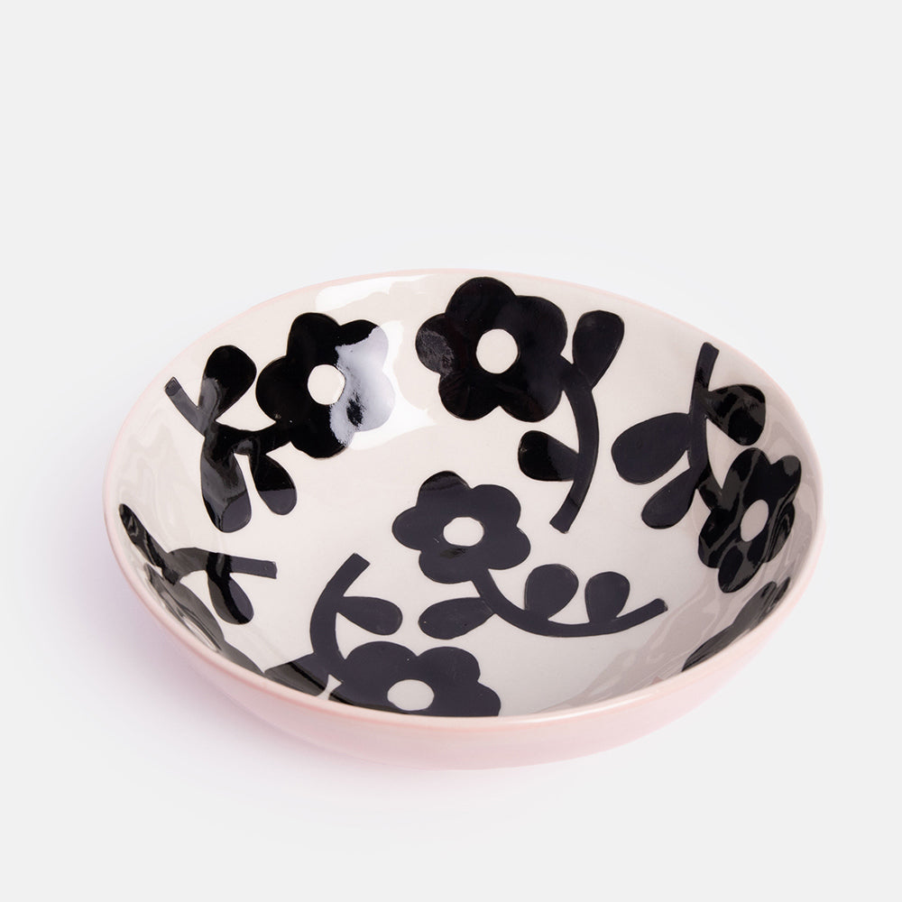 ceramic stoneware cereal bowl with pink outer and monochrome flower design inside