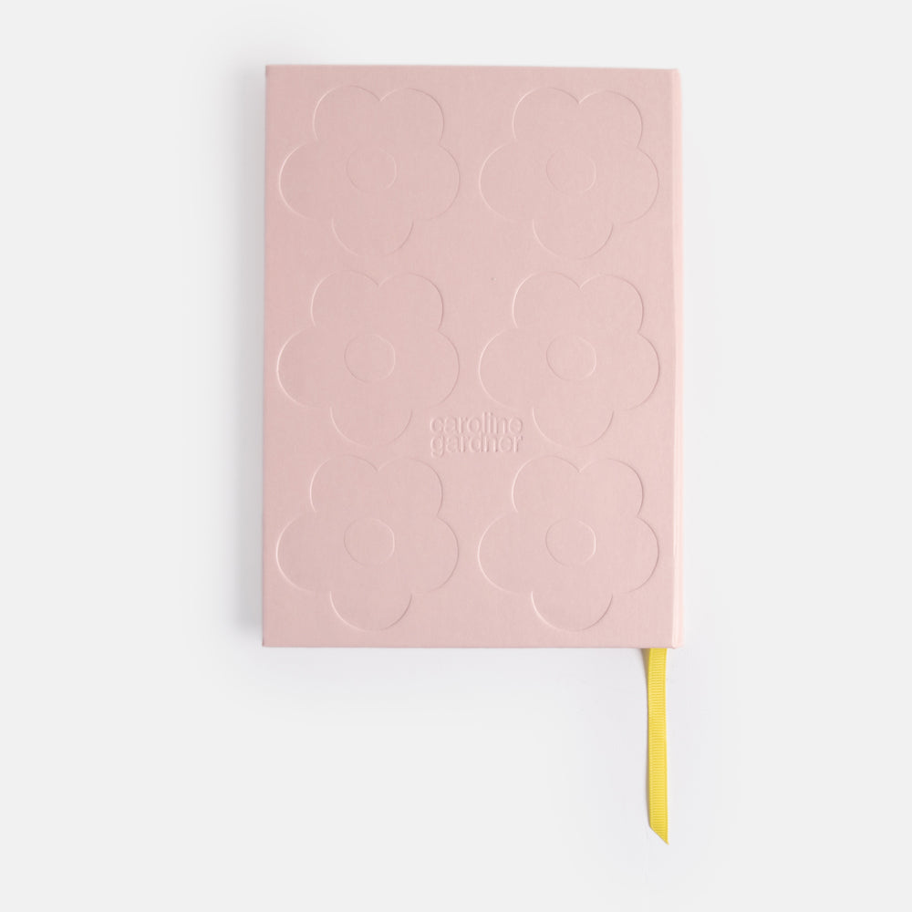 slim casebound hardcover notebook with pink debossed flower cover design