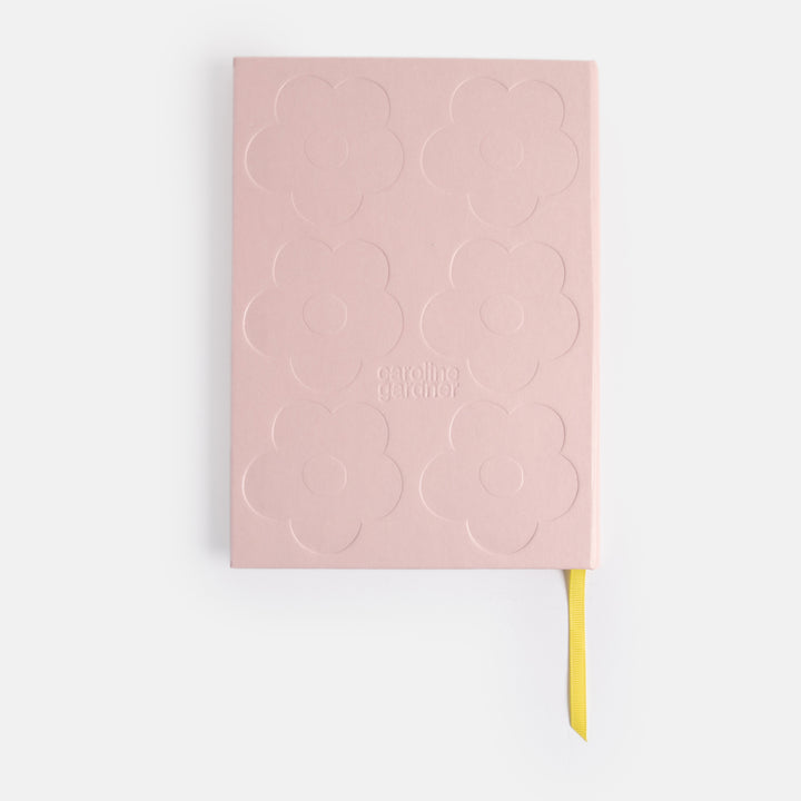 slim casebound hardcover notebook with pink debossed flower cover design