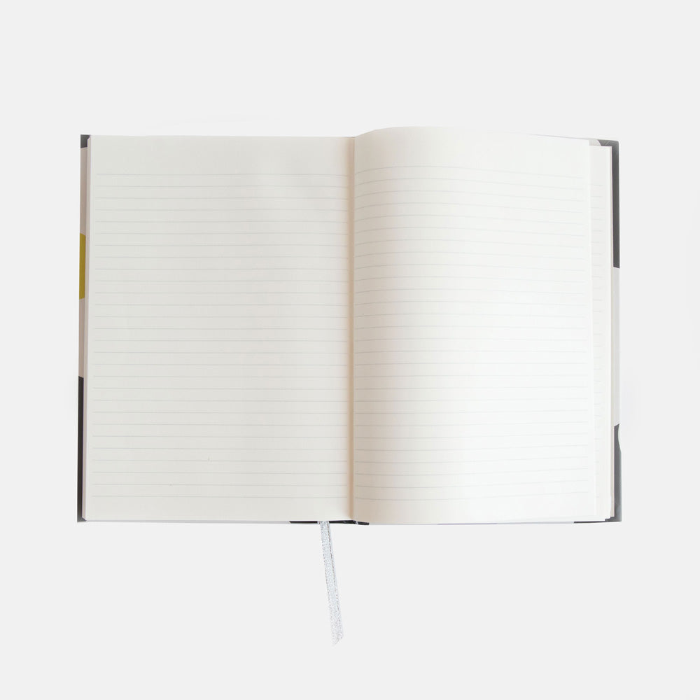 slim casebound hardcover notebook with cream and white striped lining and lined pages
