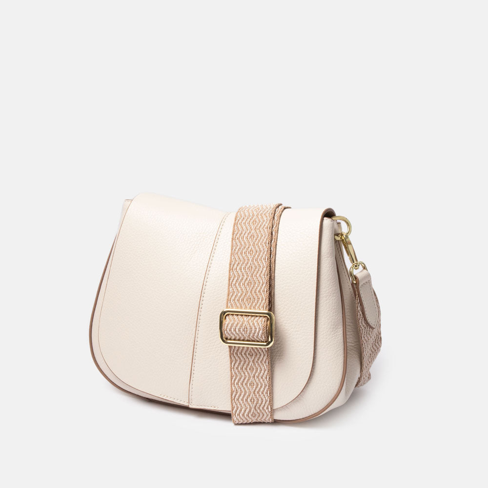off white leather saddle shape handbag with beige webbing strap