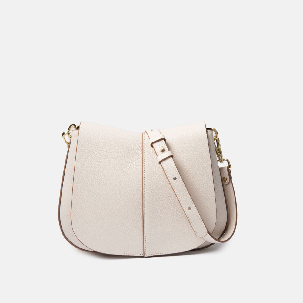 off white leather saddle shape handbag with white leather strap