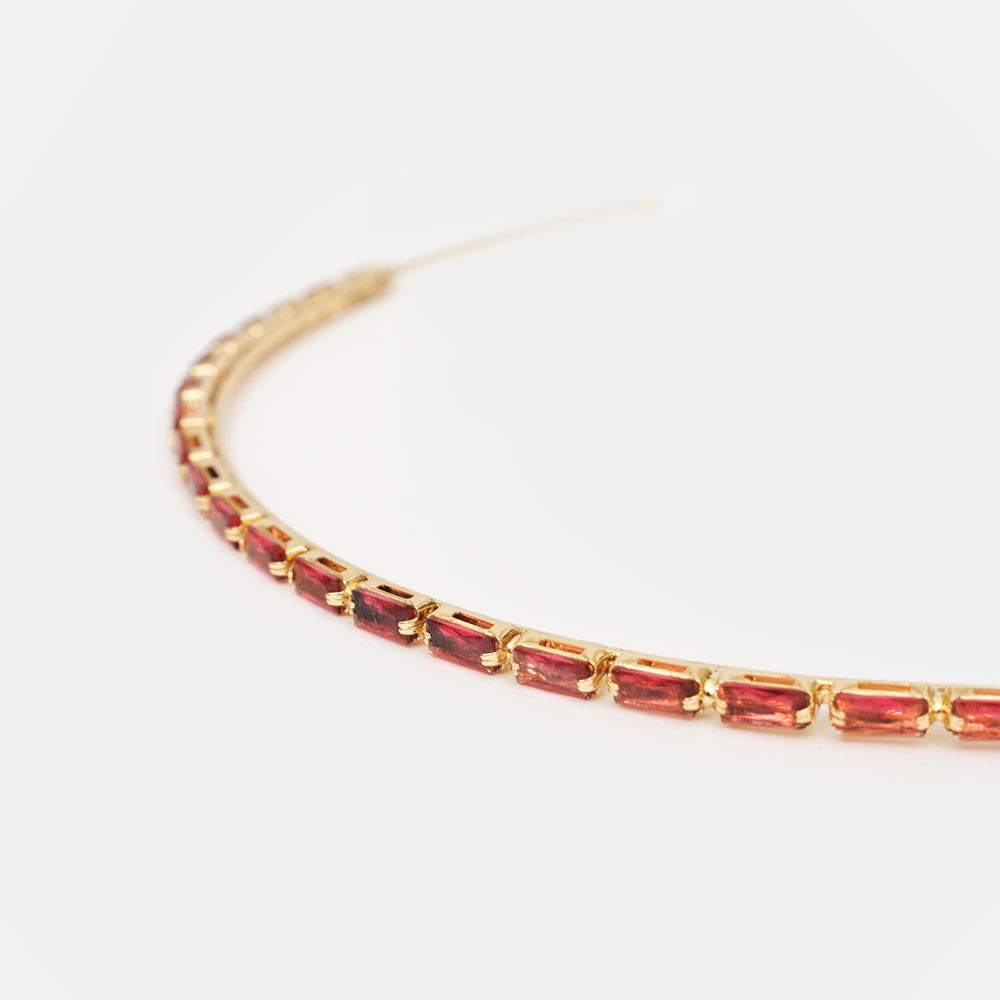 gold headband with magenta jewels 