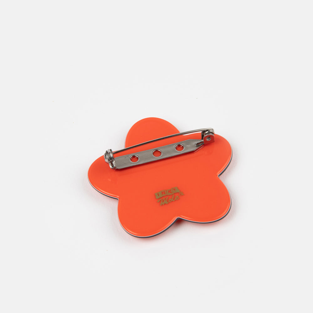 Red and orange floral brooch by Inky & Mole