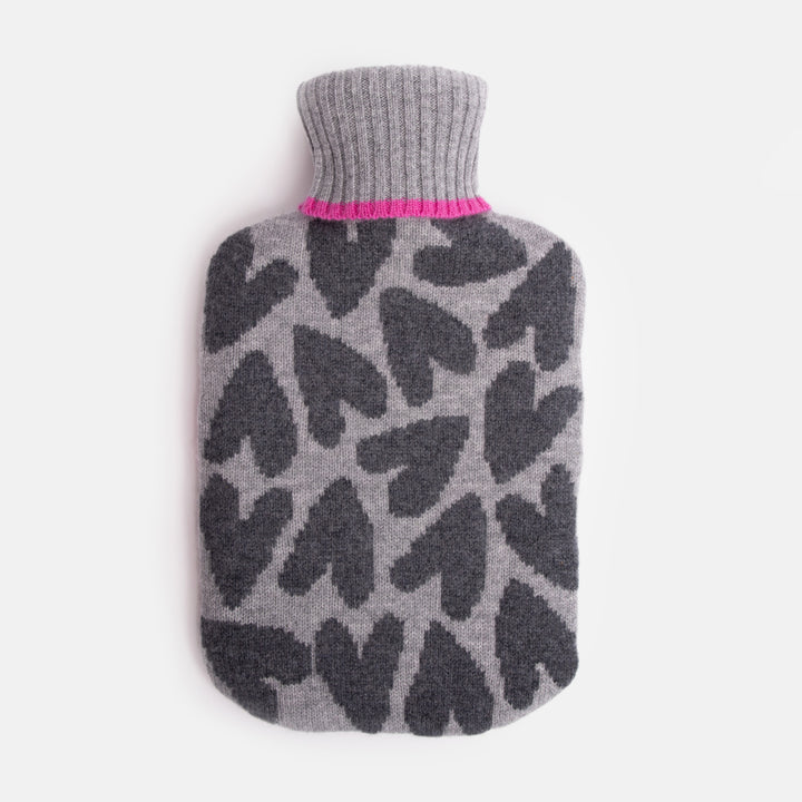 pure merino wool hot water bottle with charcoal grey hearts on a grey base, highlighted with bright pink trims