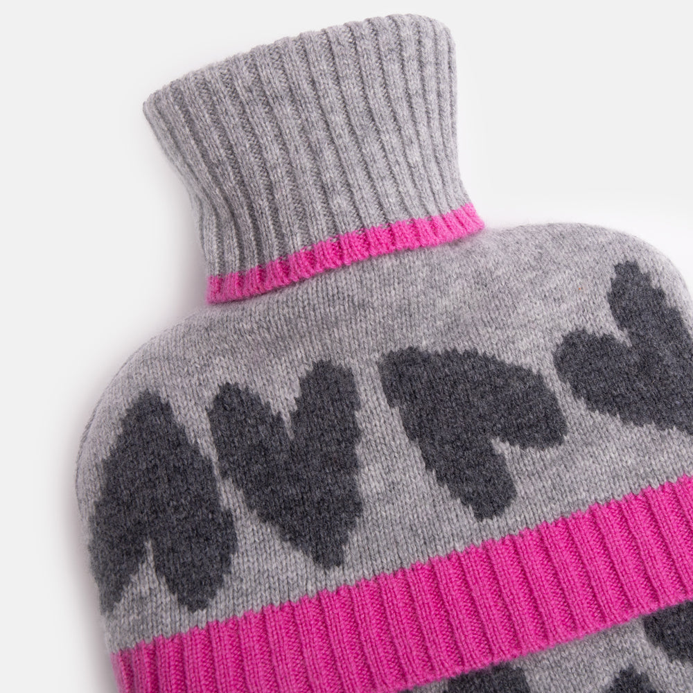 pure merino wool hot water bottle with charcoal grey hearts on a grey base, highlighted with bright pink trims