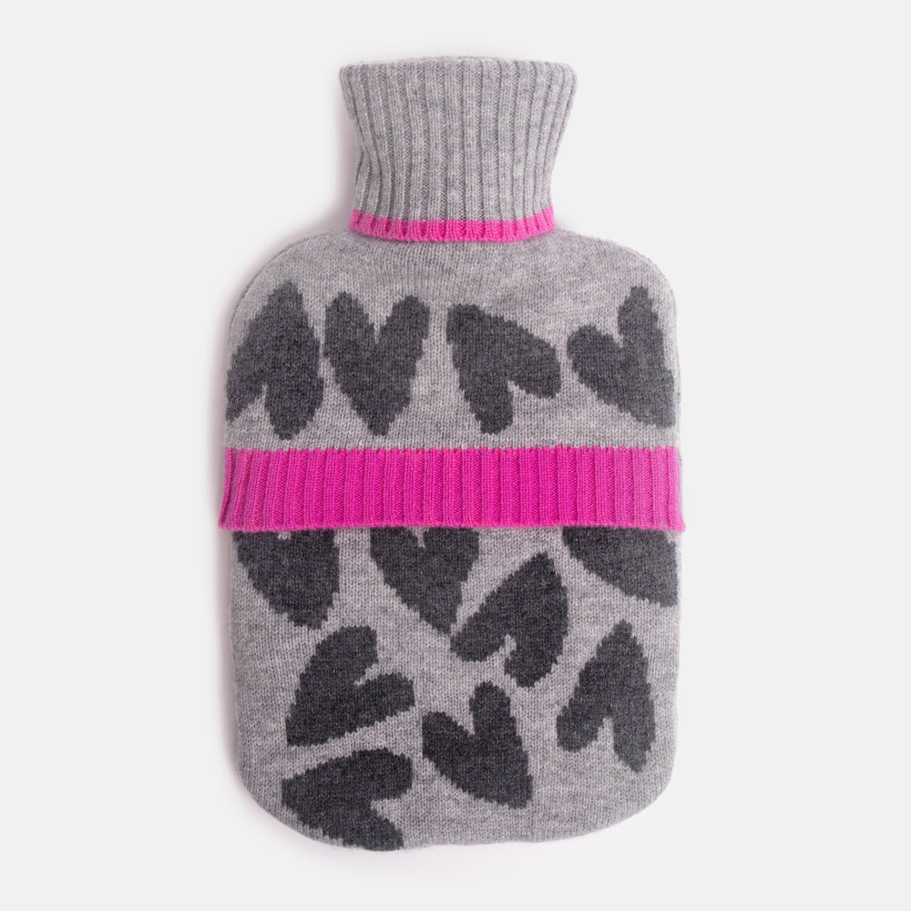 pure merino wool hot water bottle with charcoal grey hearts on a grey base, highlighted with bright pink trims