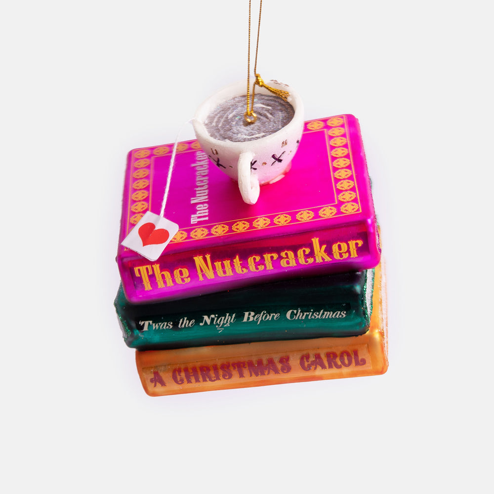 glass stack of books with teacup on top hanging christmas tree dcoration