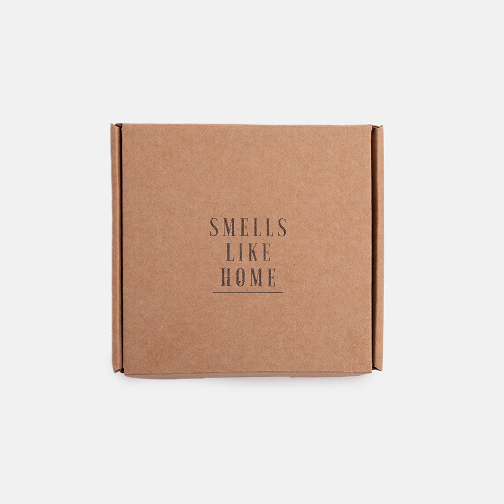 white concrete ridged soap dish box with smells like home branding
