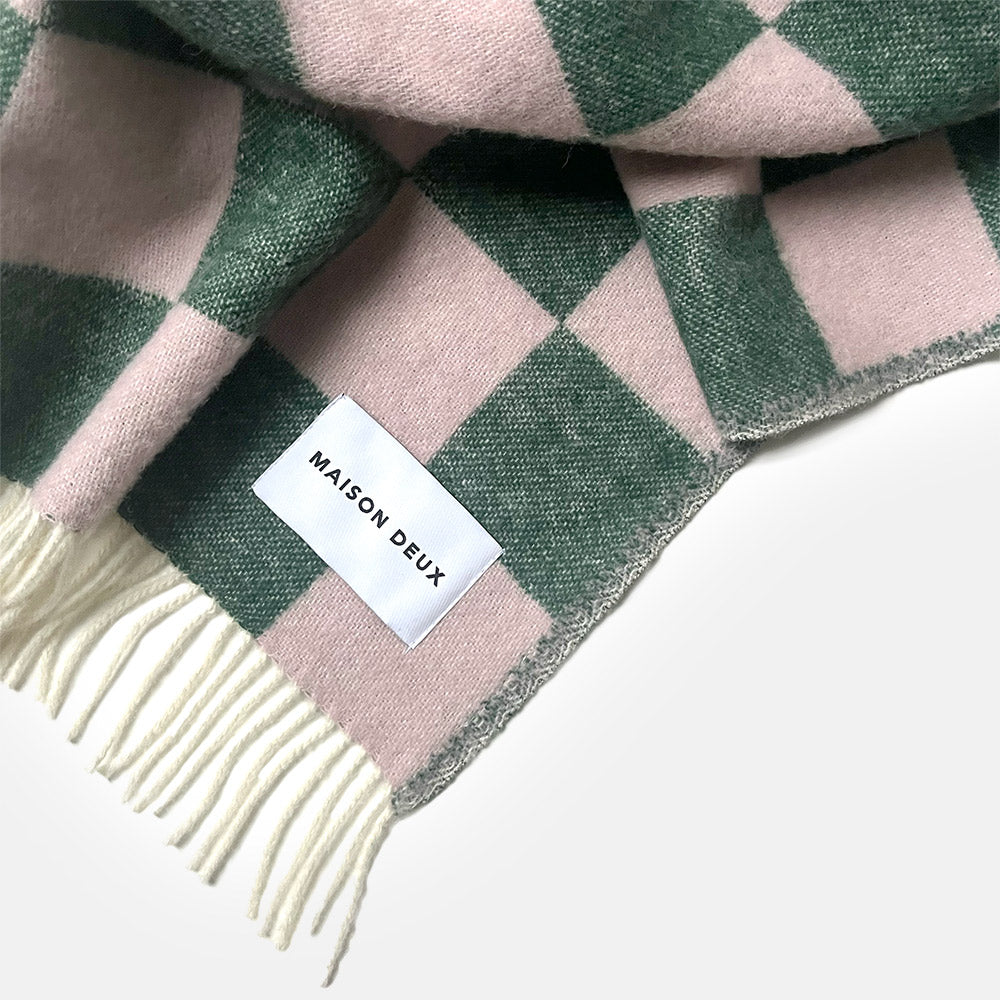 Pink and green checkerboard pattern pure wool blanket, woven in Europe and made by Maison Deux