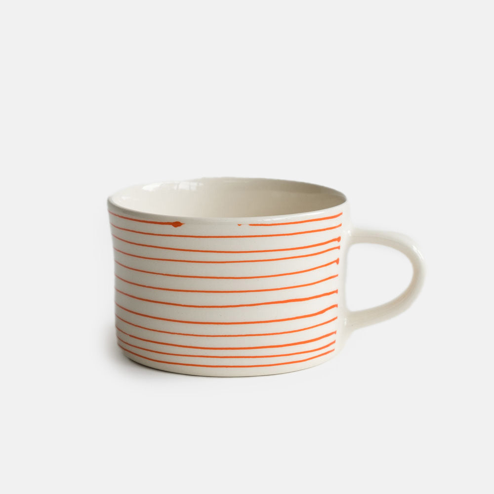 tangerine orange stripe ceramic stoneware mug, made by Musango