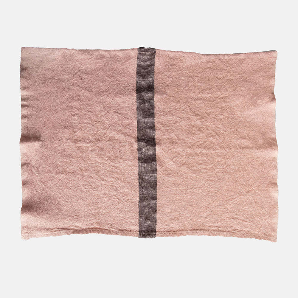 set of 2 light pink washed linen placemats with dark central stripe