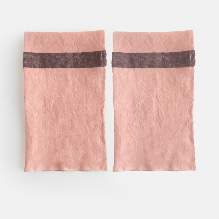 Set of 2 pink placemats with a dark grey stripe 