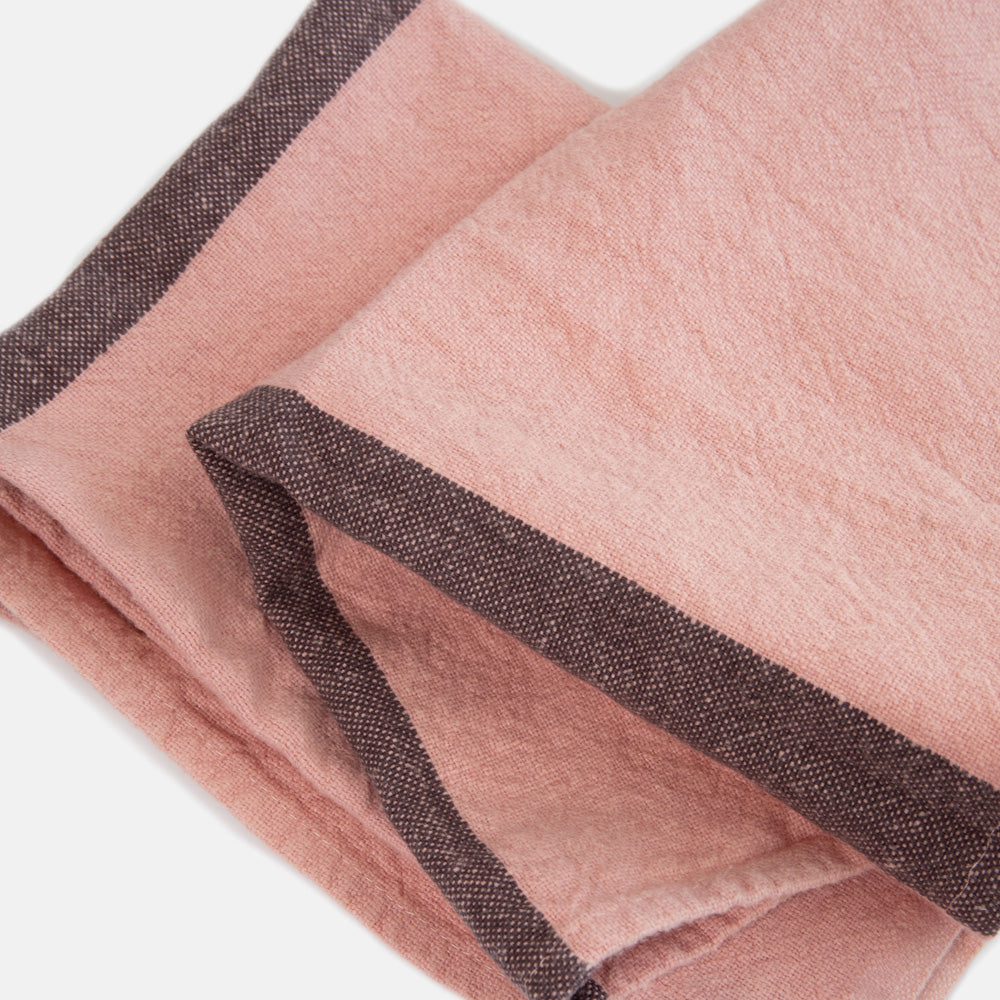 Set of 2 pink placemat with a dark grey stripe folded