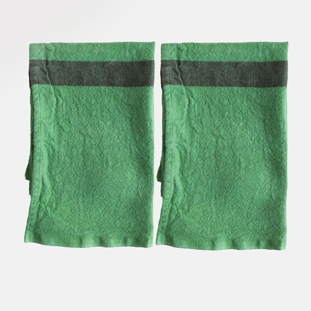 set of 2 green washed linen placemats with dark central stripe