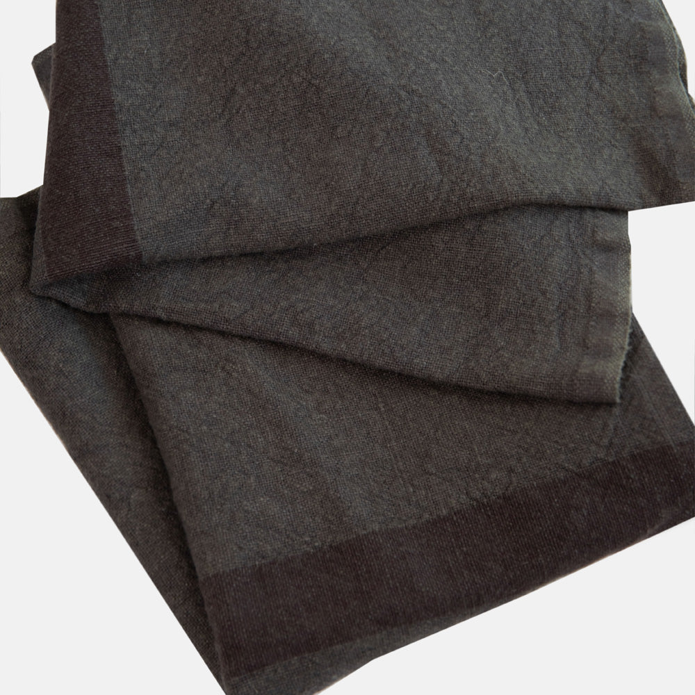 set of 2 graphite grey washed linen placemats with dark grey central stripe
