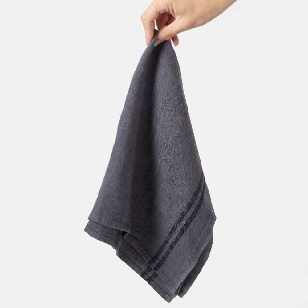 steel grey linen tea towel with 2 dark stripes at either end