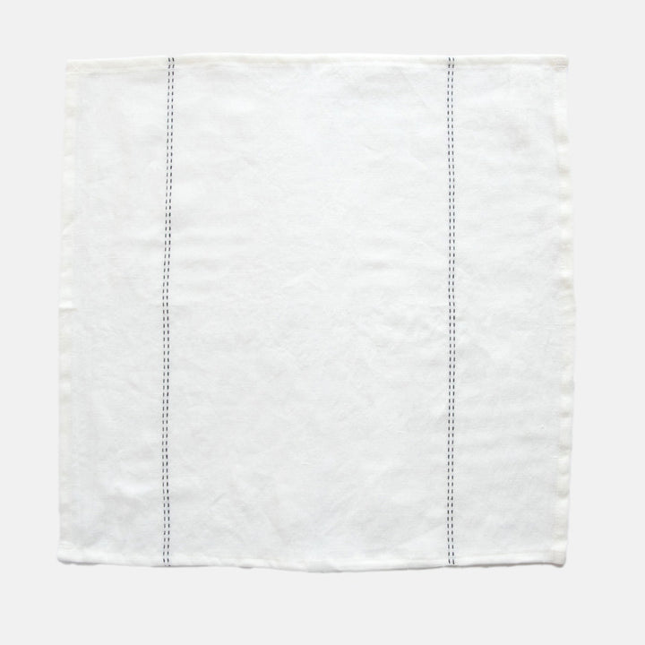 set of 4 white linen napkins with black stitch detailing 