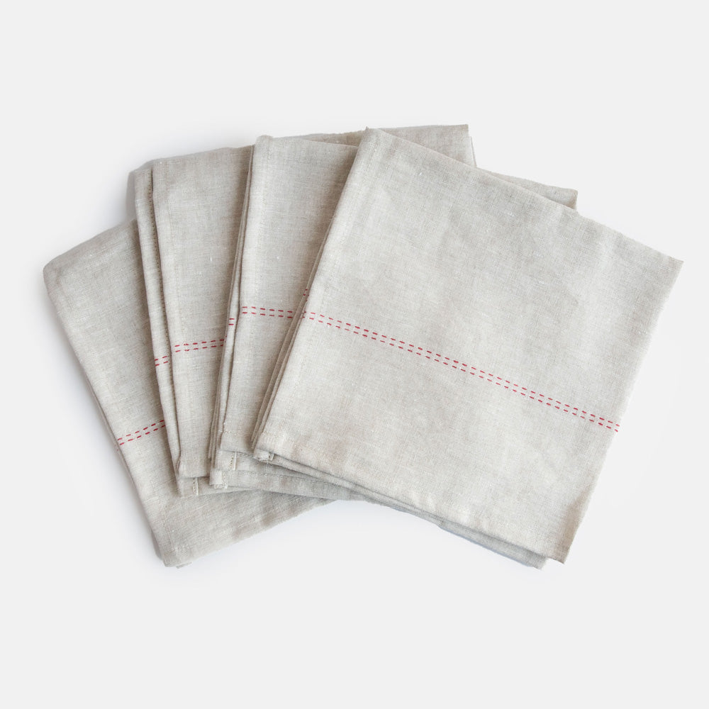 set of 4 natural linen napkins with red stitch detailing 