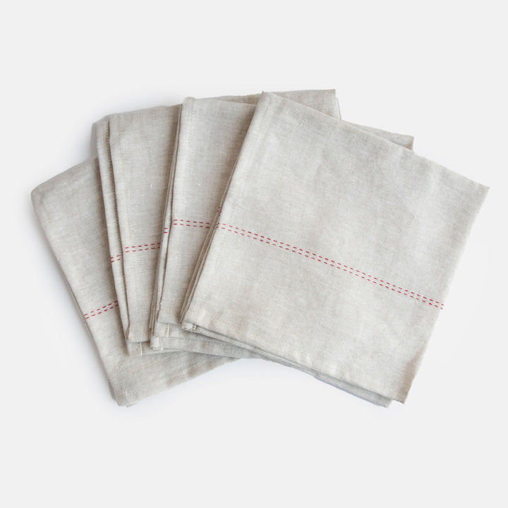 set of 4 natural linen napkins with red stitch detailing 