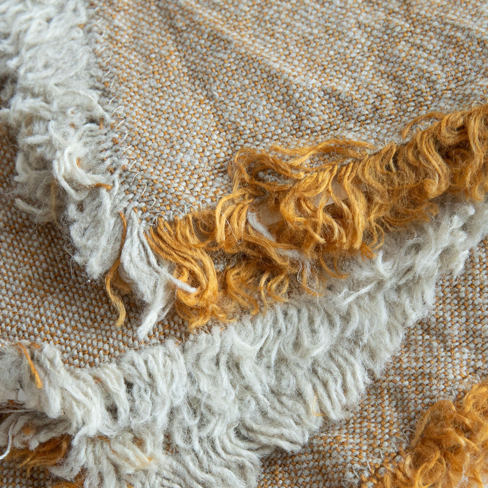 set of 4 ochre yellow textured linen napkins with tasselled edges