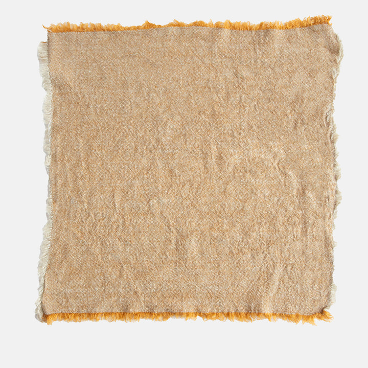 set of 4 ochre yellow textured linen napkins with tasselled edges