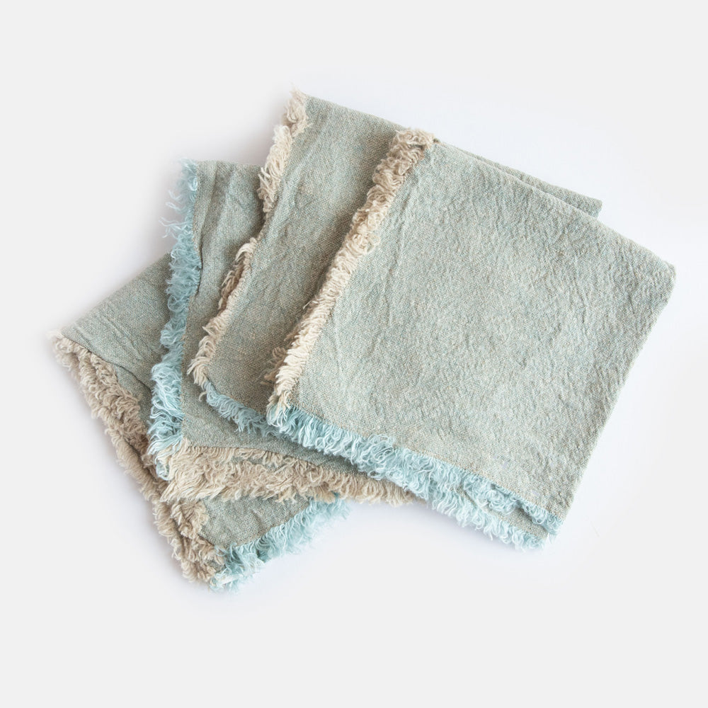 set of 4 mint green textured linen napkins with tasselled edges