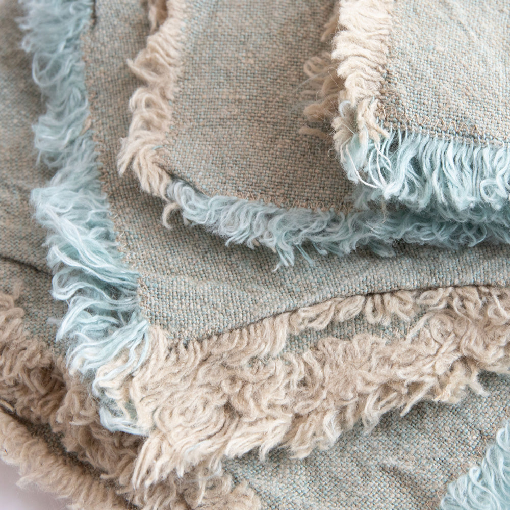 set of 4 mint green textured linen napkins with tasselled edges