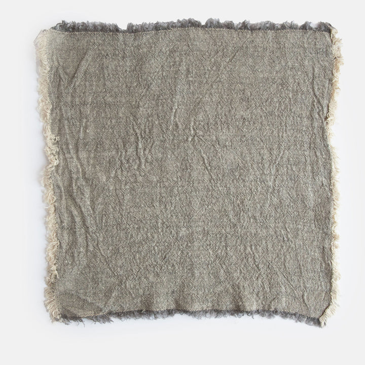 graphite grey linen napkin with tasselled edges