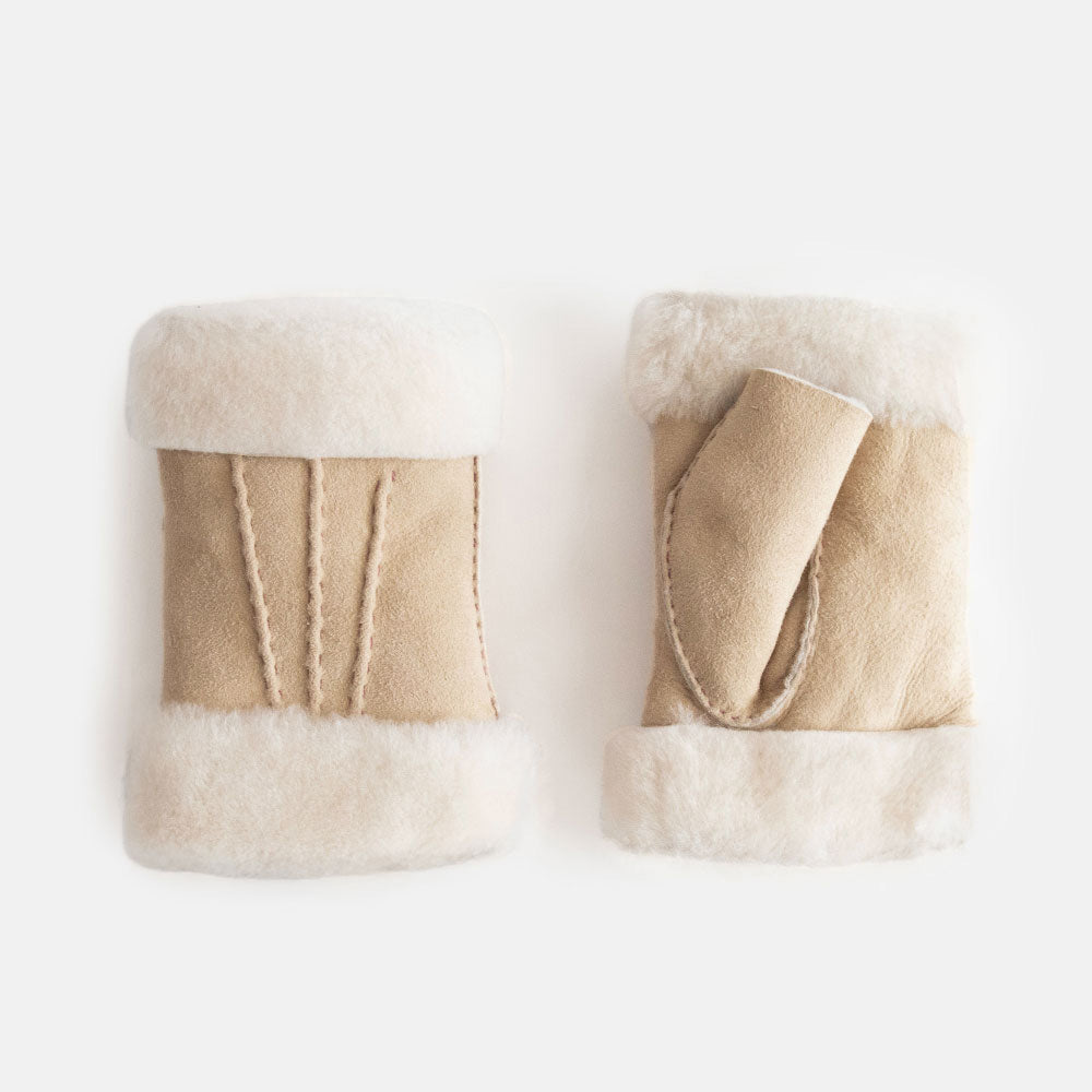 pair of women's sheepskin shearling wrist warmers in natural cork colour