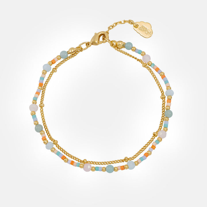 duo bracelet with one fine gold chain and one chain with Miyuki, natural quartz and glass beads. 
