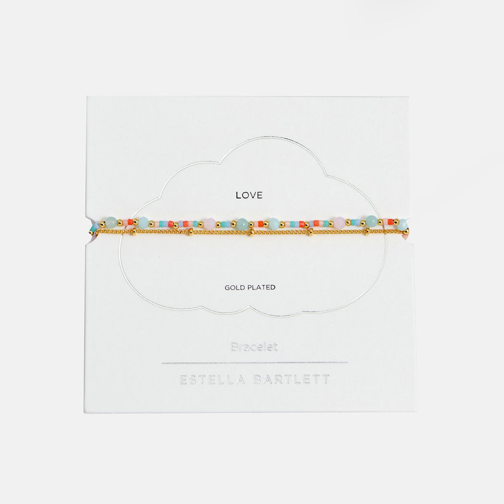 duo bracelet with one fine gold chain and one chain with Miyuki, natural quartz and glass beads. 