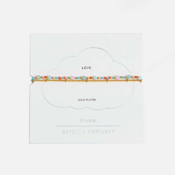 duo bracelet with one fine gold chain and one chain with Miyuki, natural quartz and glass beads. 