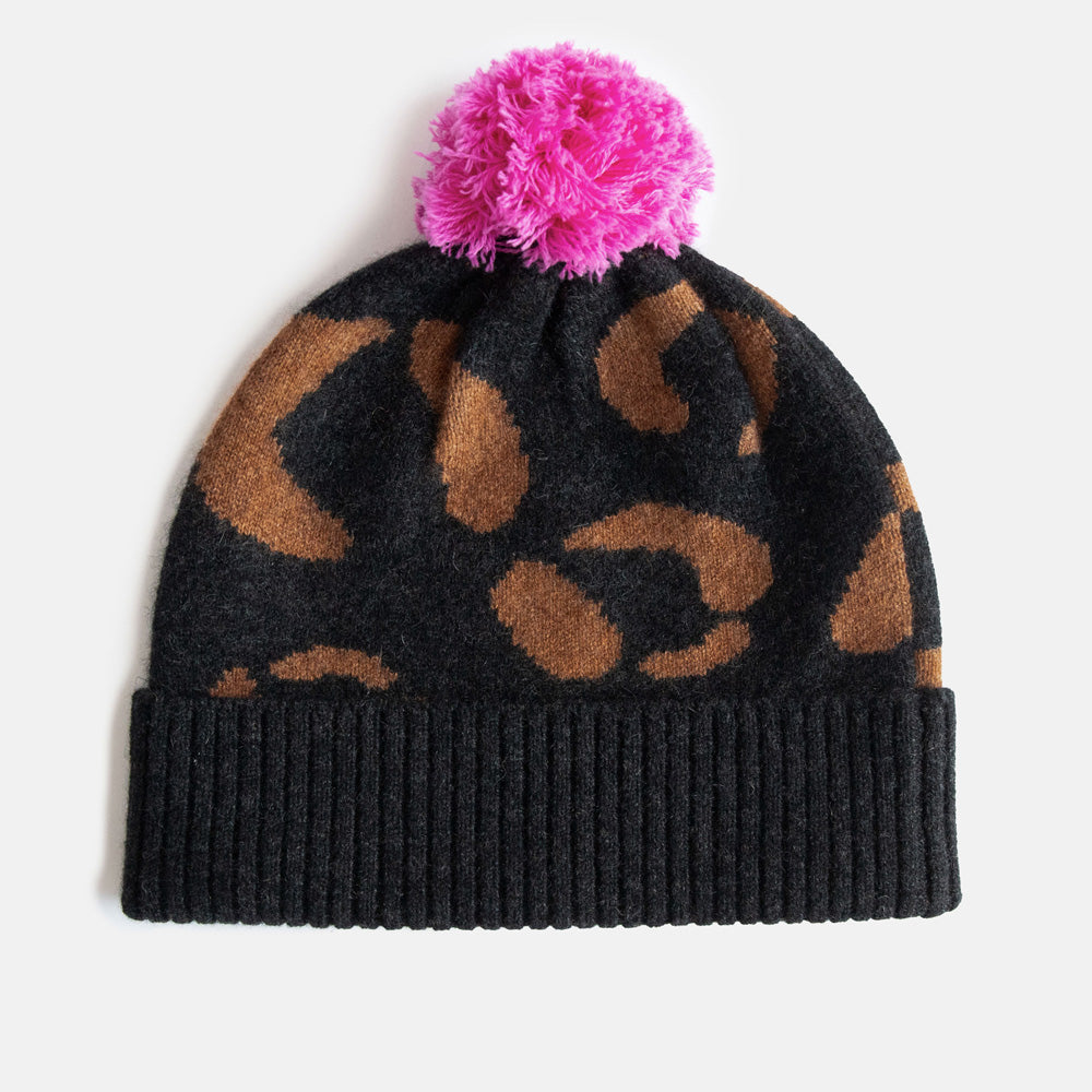 women's cashmere beanie hat in dark grey with brown leopard print and bright pink pom pom