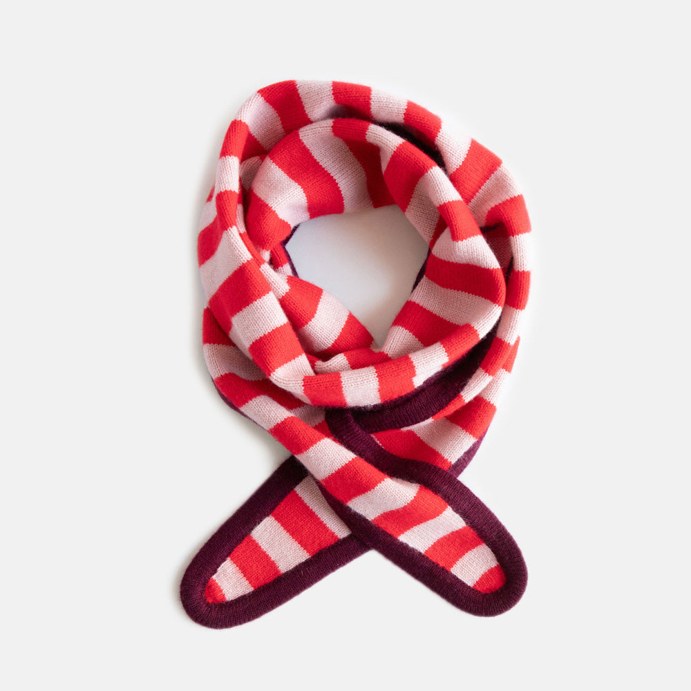 women's cashmere neck scarf in red & pink stripe design with contrast burgundy trim. 