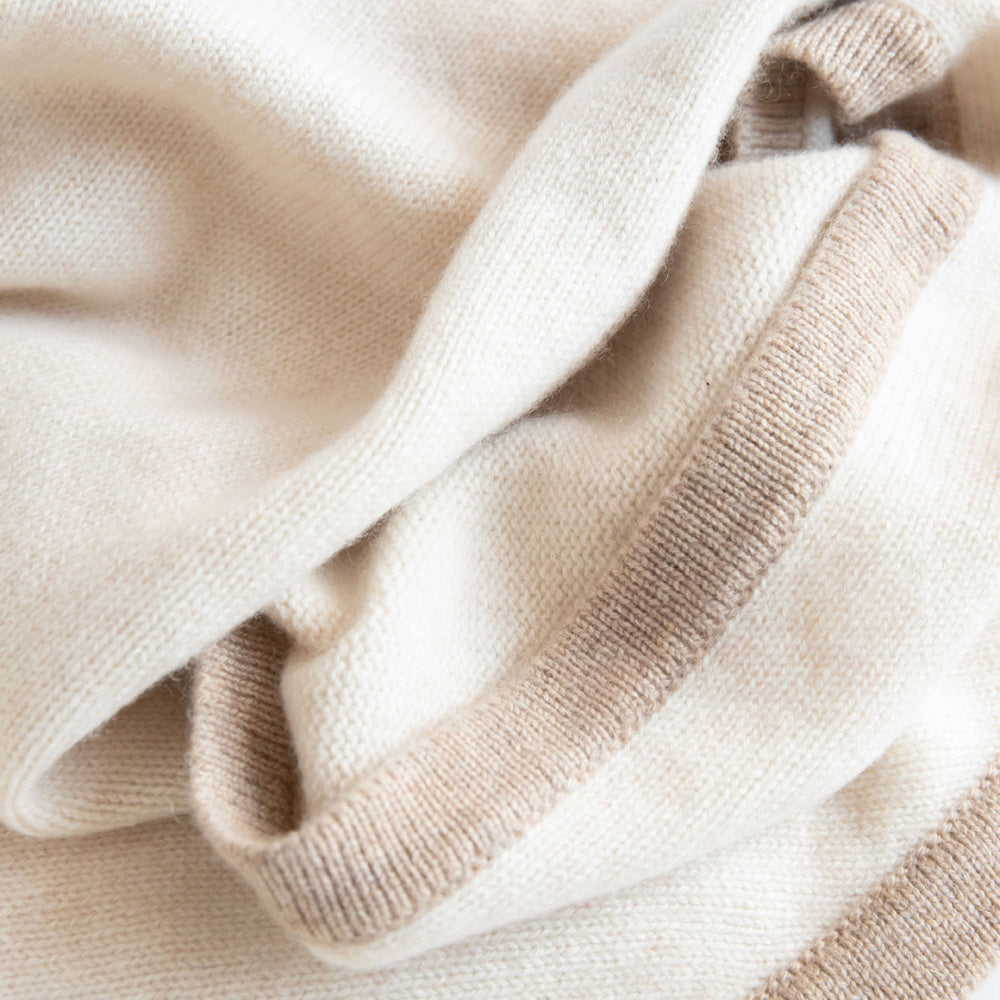 women's cashmere triangle scarf in cream colour with taupe trim