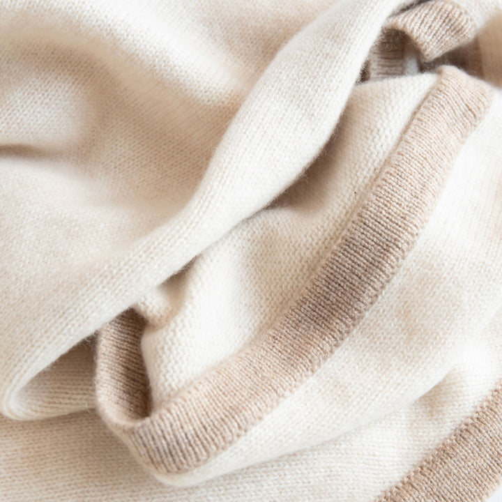 women's cashmere triangle scarf in cream colour with taupe trim