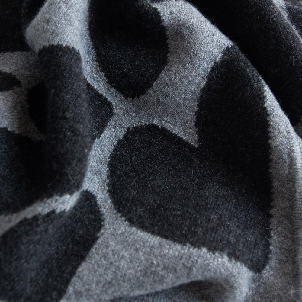 women's cashmere triangle scarf in light grey with dark grey hearts design