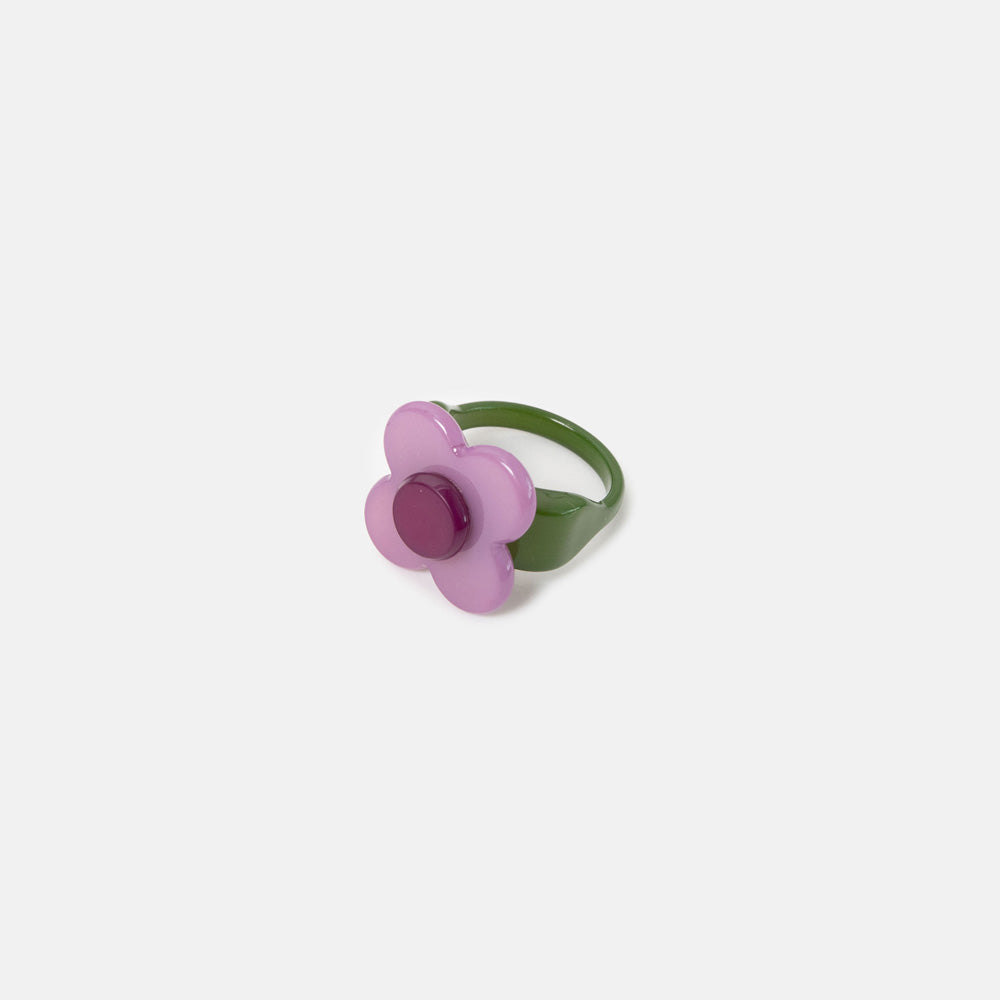 ring with lilac/purple flower on a green ring