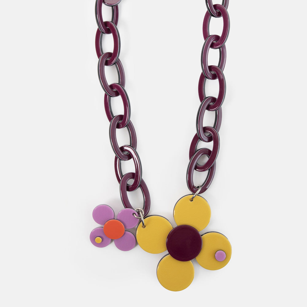 purple chunky large loop chain necklace with yellow and lilac flower pendants 