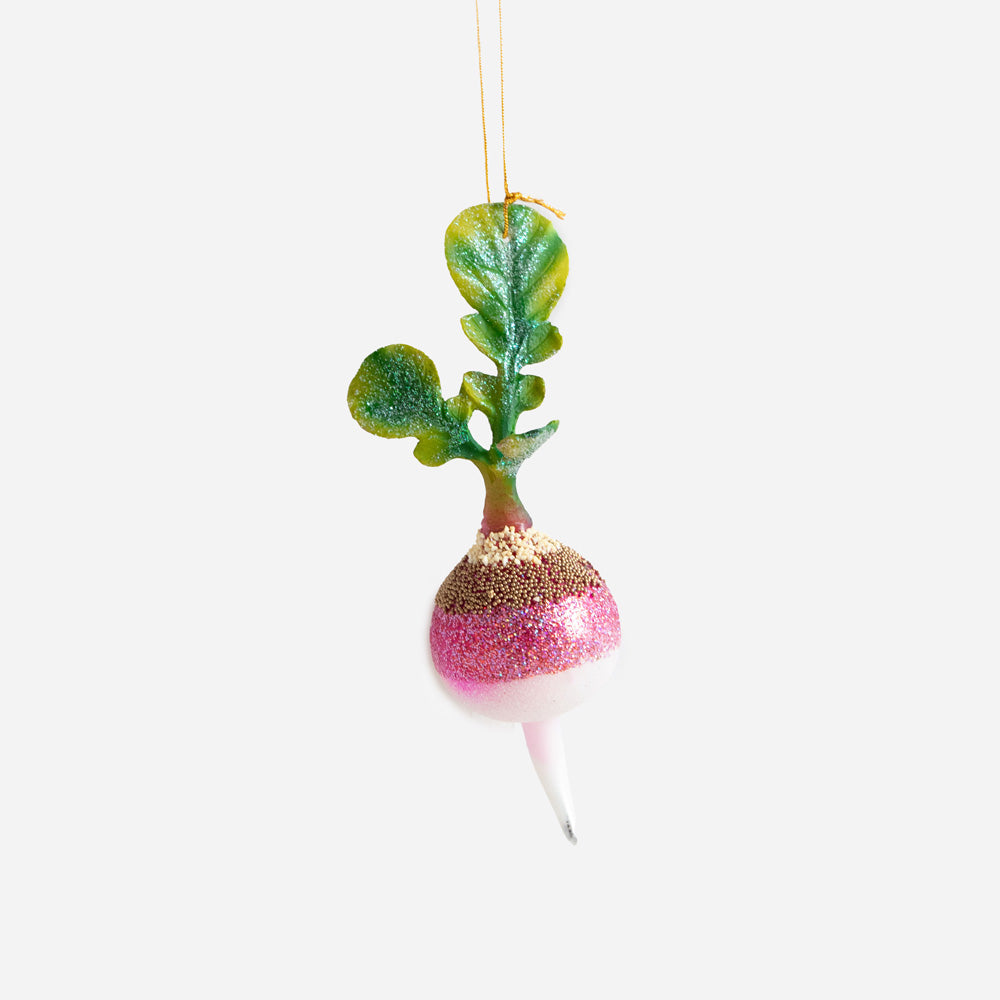 Decorative radish hanging Christmas tree decoration with green top and pink bottom and finished with glitter