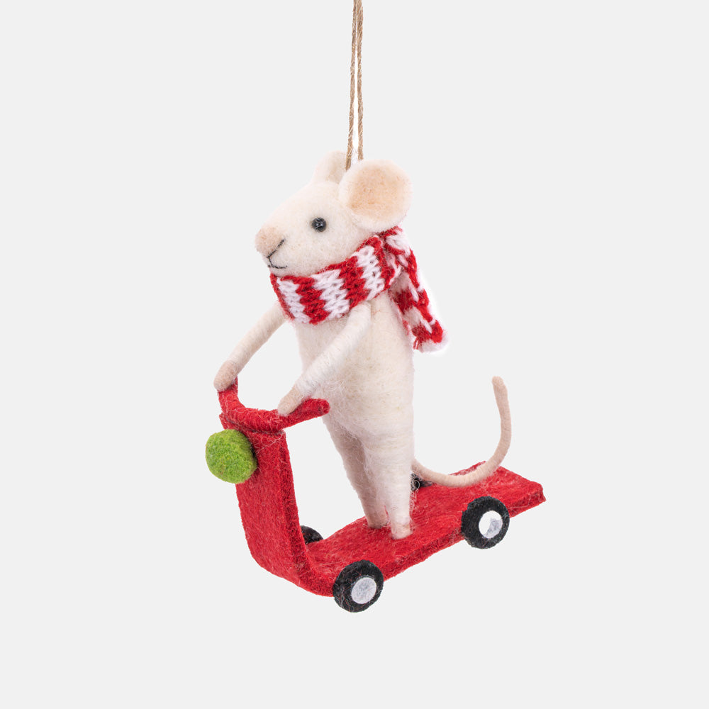 Mouse on a scooter with a red and white striped scarf hanging Christmas tree decoration, against a light grey background.