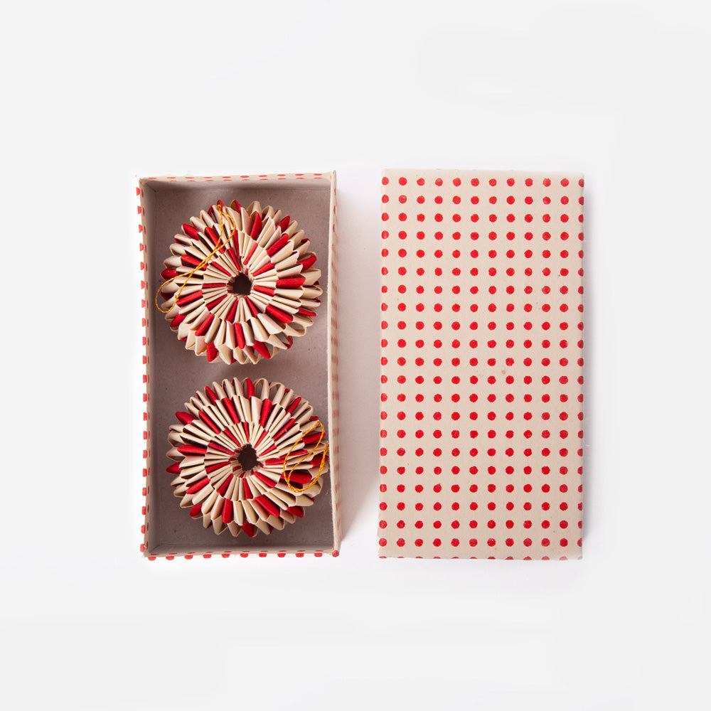 set of 2 red and white paper wheel Christmas decorations in a presentation box 